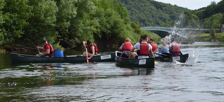 Corporate groups canoeing